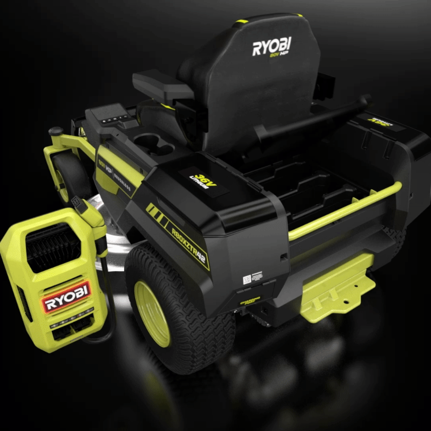Three 80V 10Ah batteries being inserted into a RYOBI ZTR Ride-on Mower